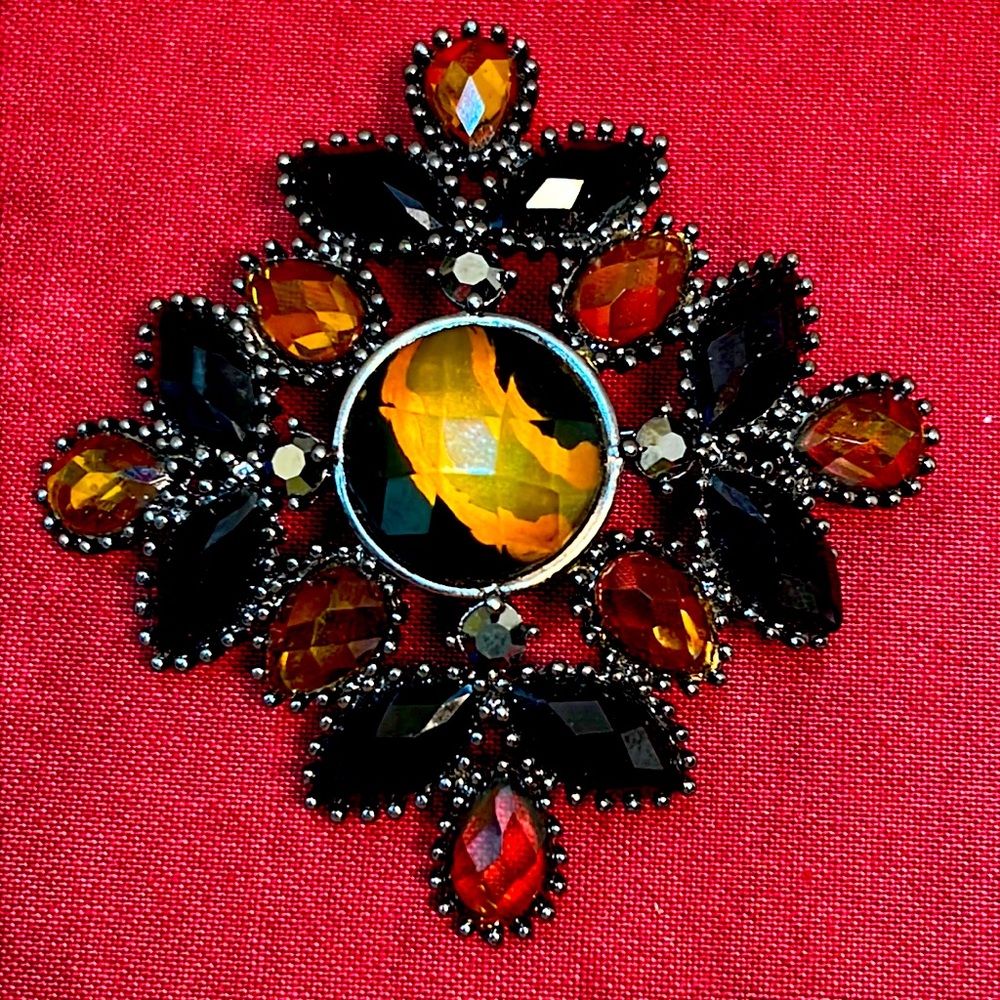 Tortoise shell color stones with gunmetal bead work setting brooch. 21/2-2 “